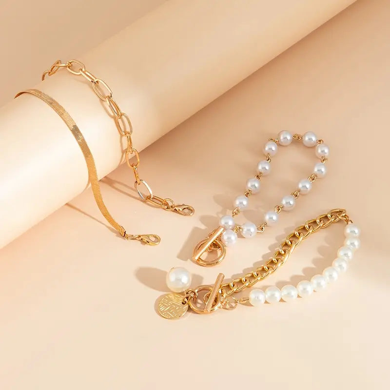 Conjunto Chic de 4 Pulseras de Oro – Serpiente, Perlas y Eslabones | Oro
