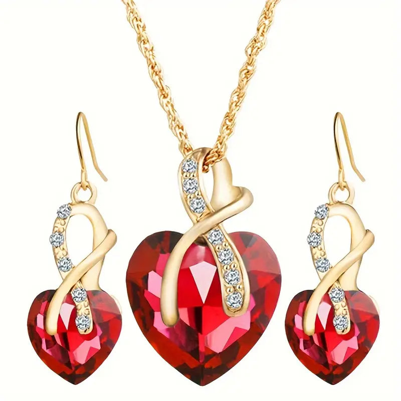 Conjunto de Joyas de Corazón Retorcido de Oro y Rubí